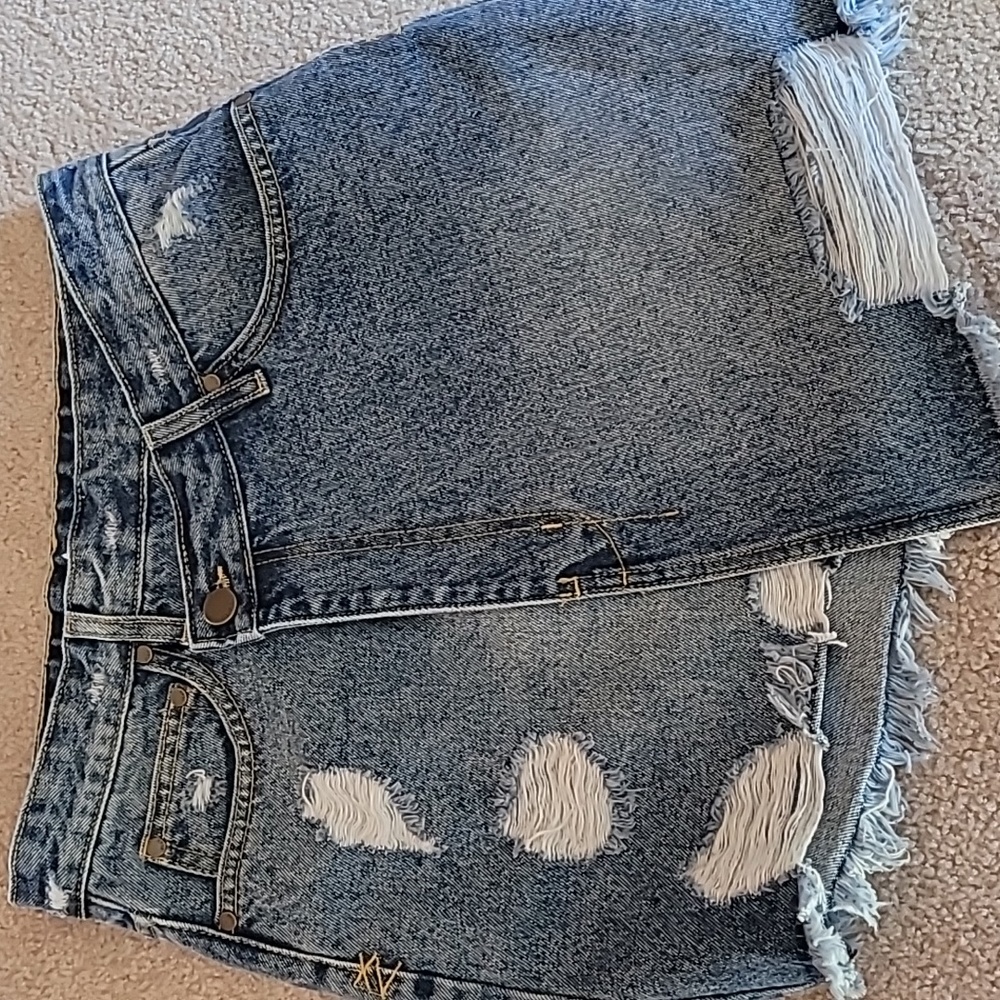 Elan distressed denim skirt